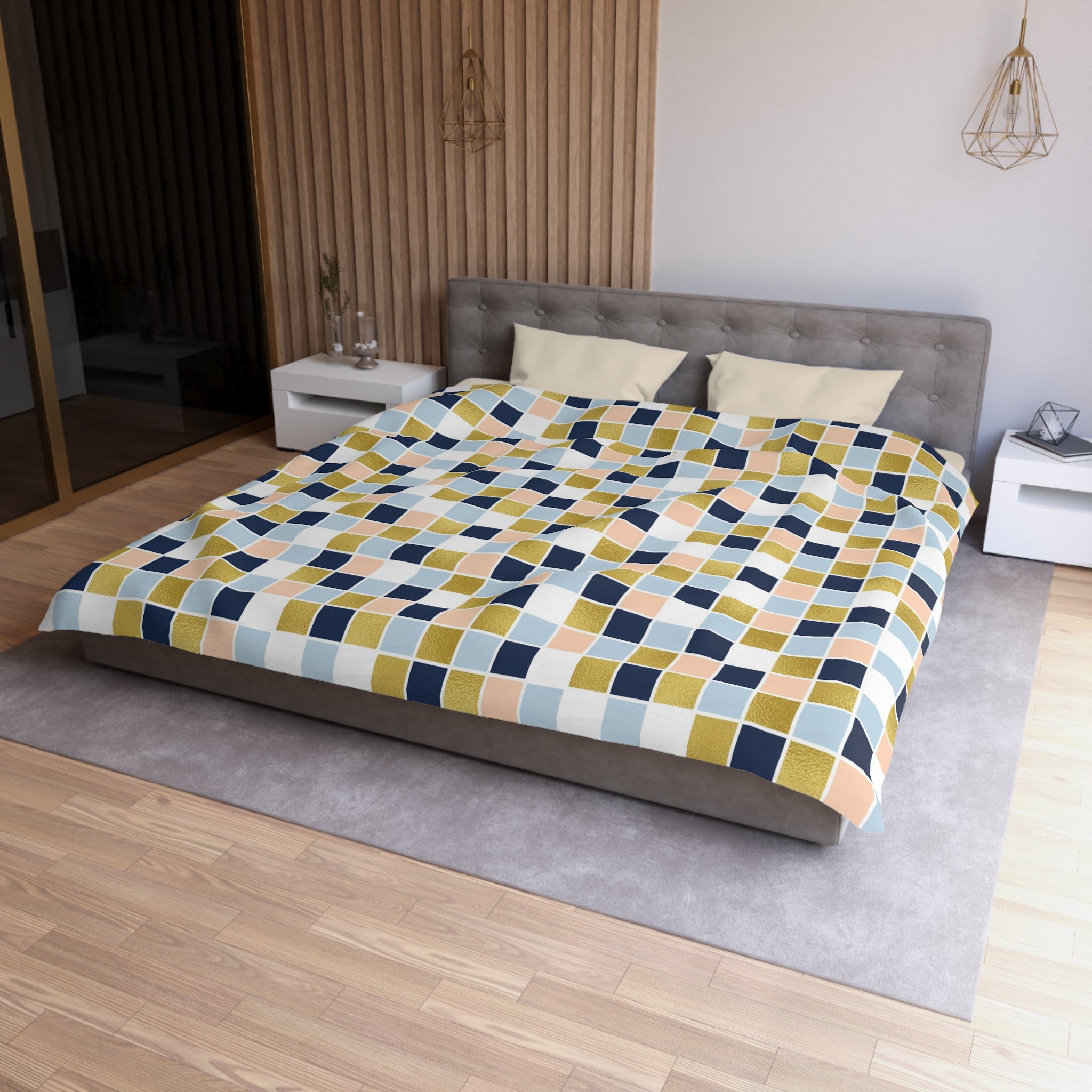 a modern bedroom with a large bed, a gray headboard, and a colorful geometric patterned bedspread.