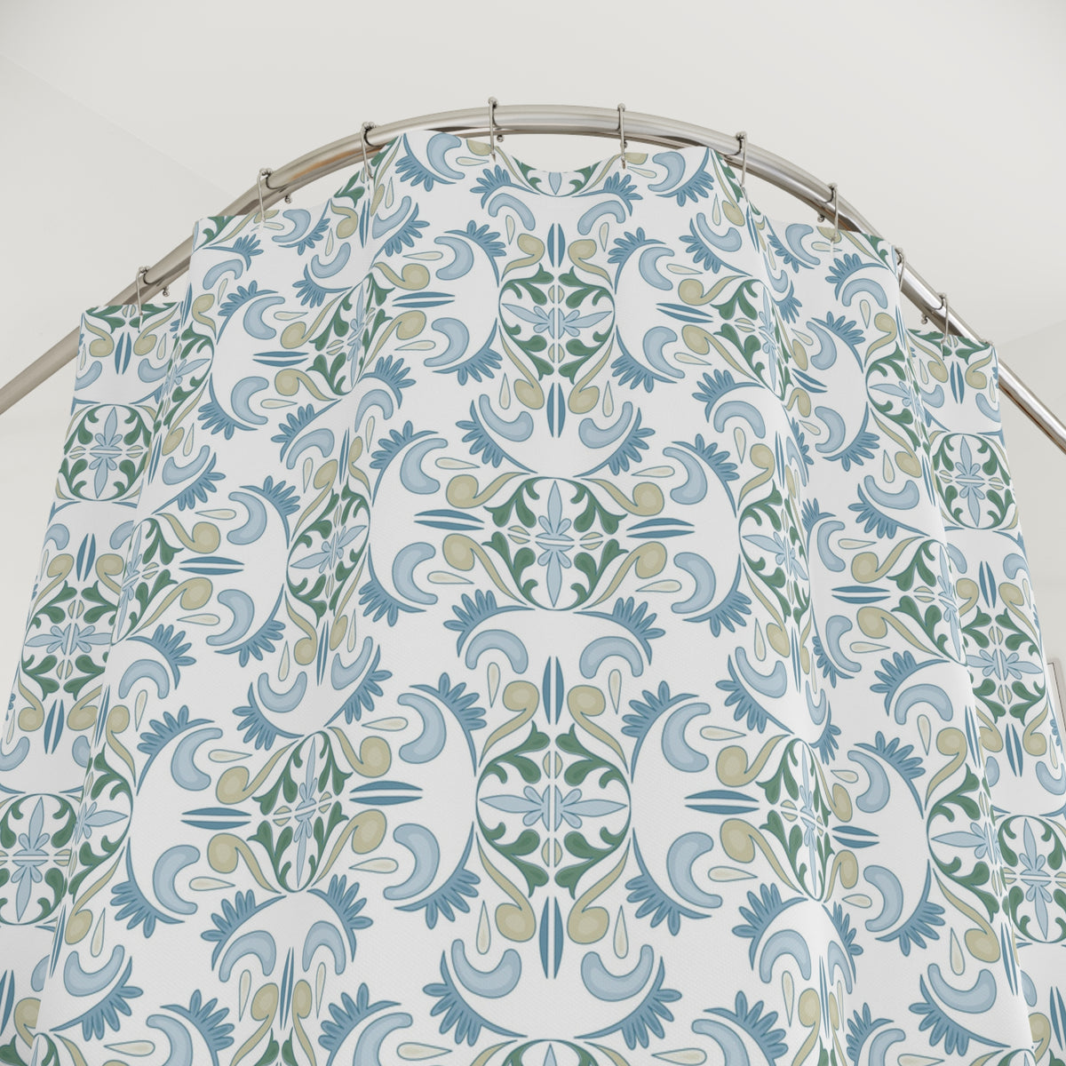 a shower curtain with a repeating floral pattern in shades of blue and green.