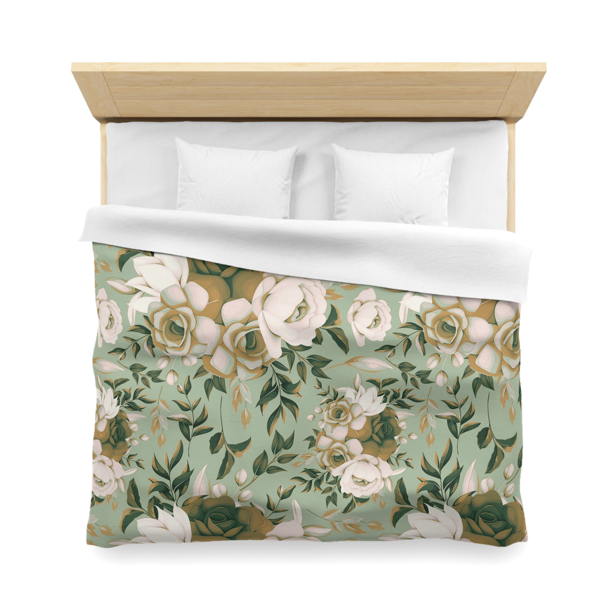 a bed with a floral print duvet cover and white pillows.