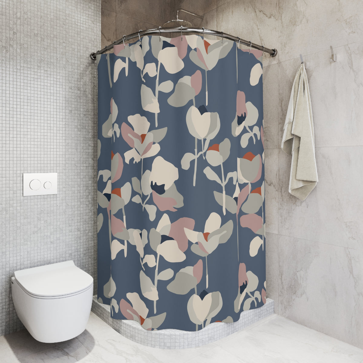 a bathroom with a shower curtain adorned with a floral pattern in shades of blue, pink, and white. The shower curtain is hanging from a rod next to a towel. The bathroom also includes a toilet and a sink.