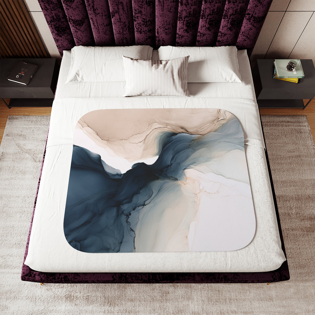 a bed with a purple and white comforter on top of it