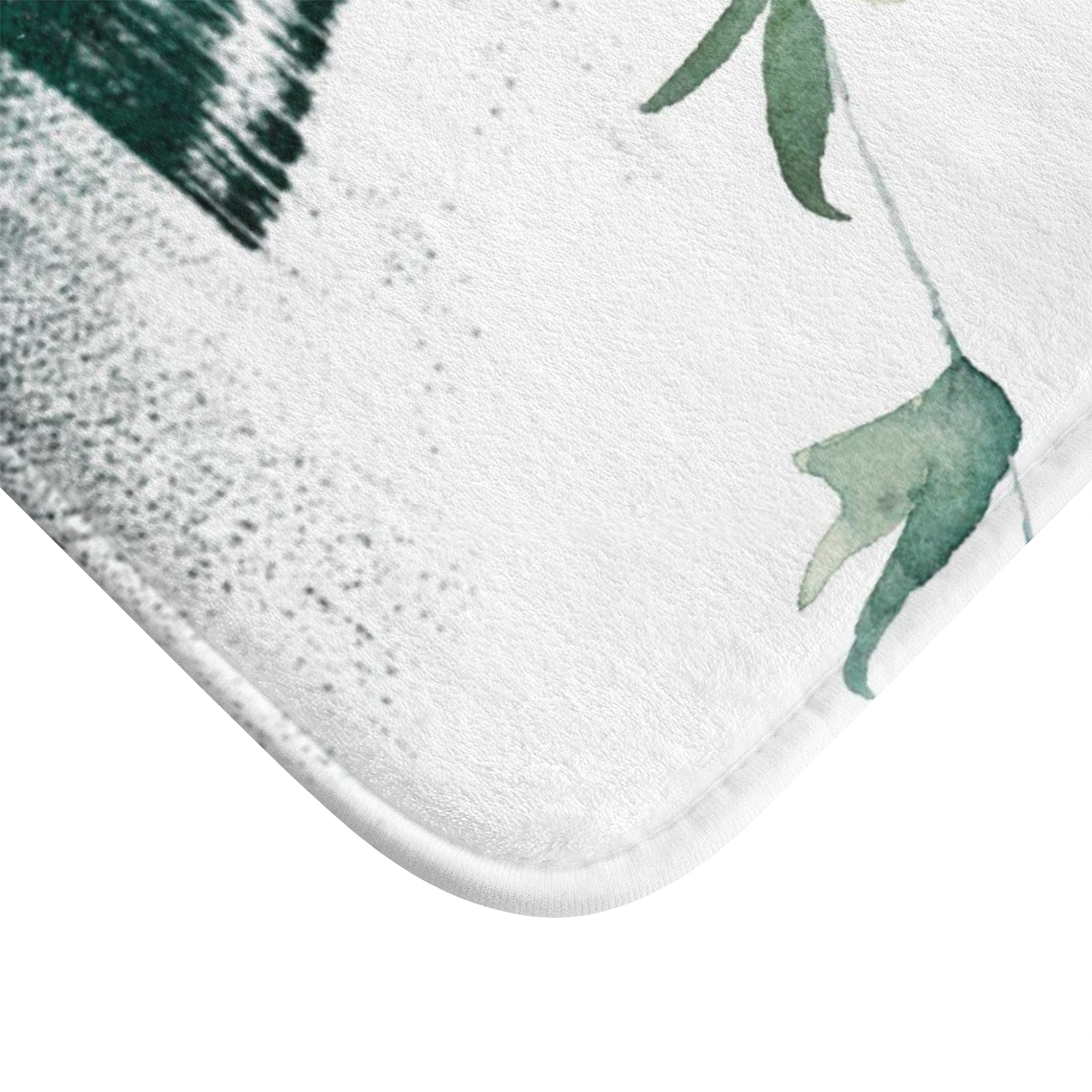 Emerald green, beige and gold floral boho abstract bath mat, close-up of the texture