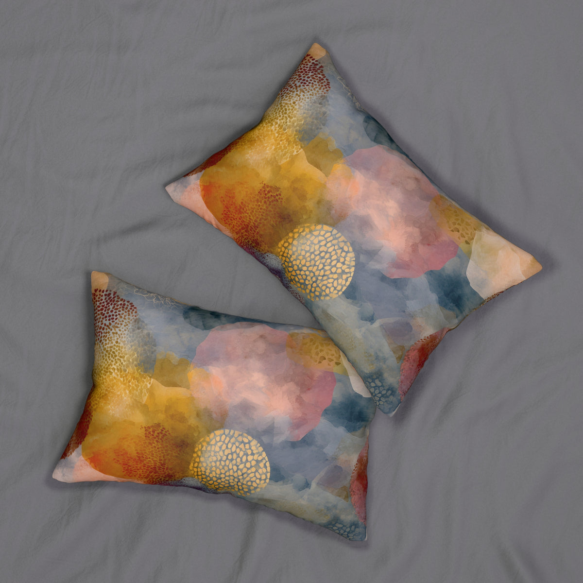 two decorative pillows with a colorful abstract pattern on a grey background.