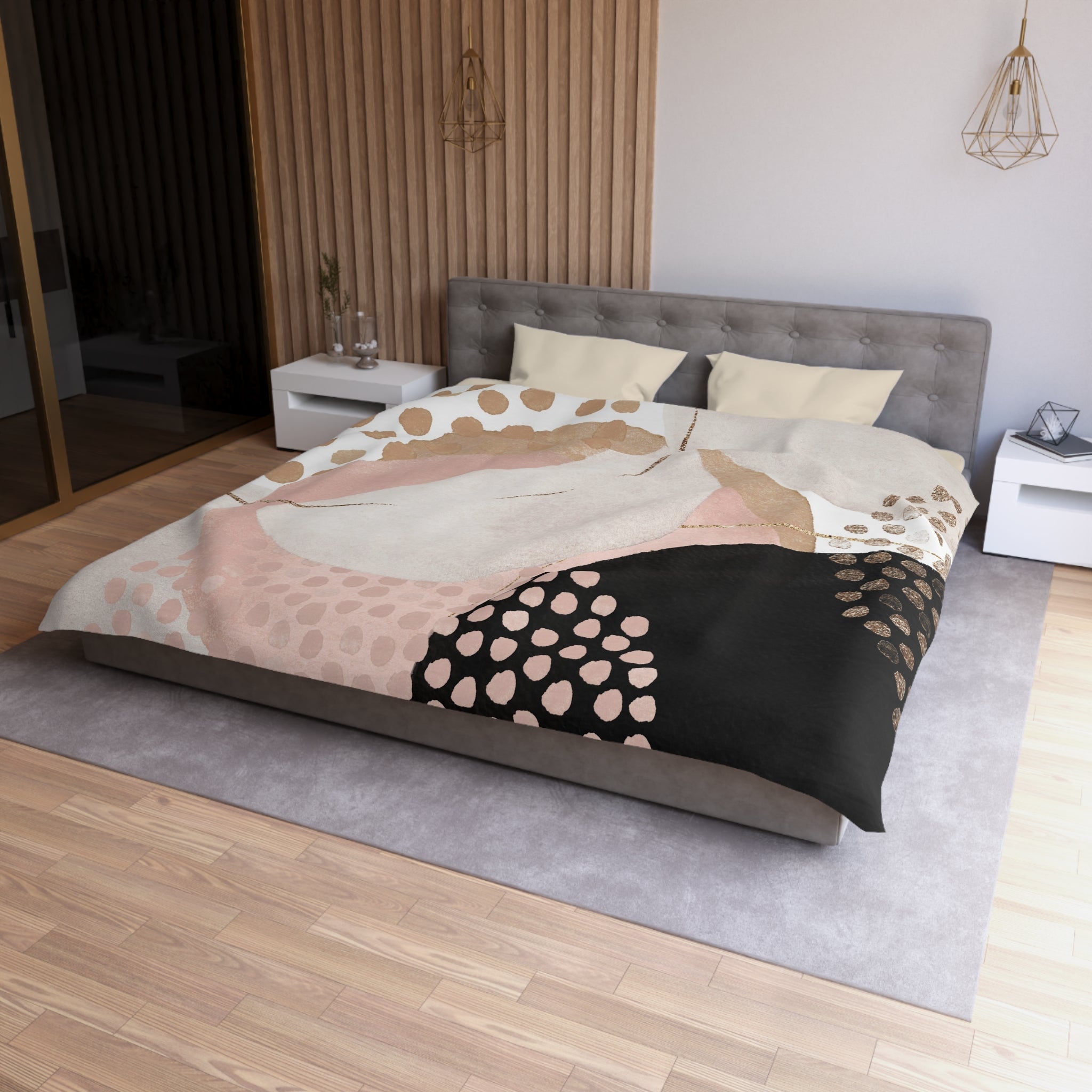 a modern bedroom with a large bed, a gray headboard, and a colorful abstract patterned comforter.