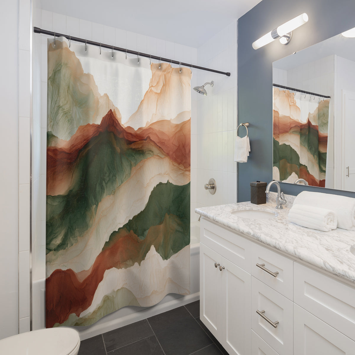 a modern bathroom with a white vanity, a large abstract mountain-themed shower curtain, and a mirror above the sink.