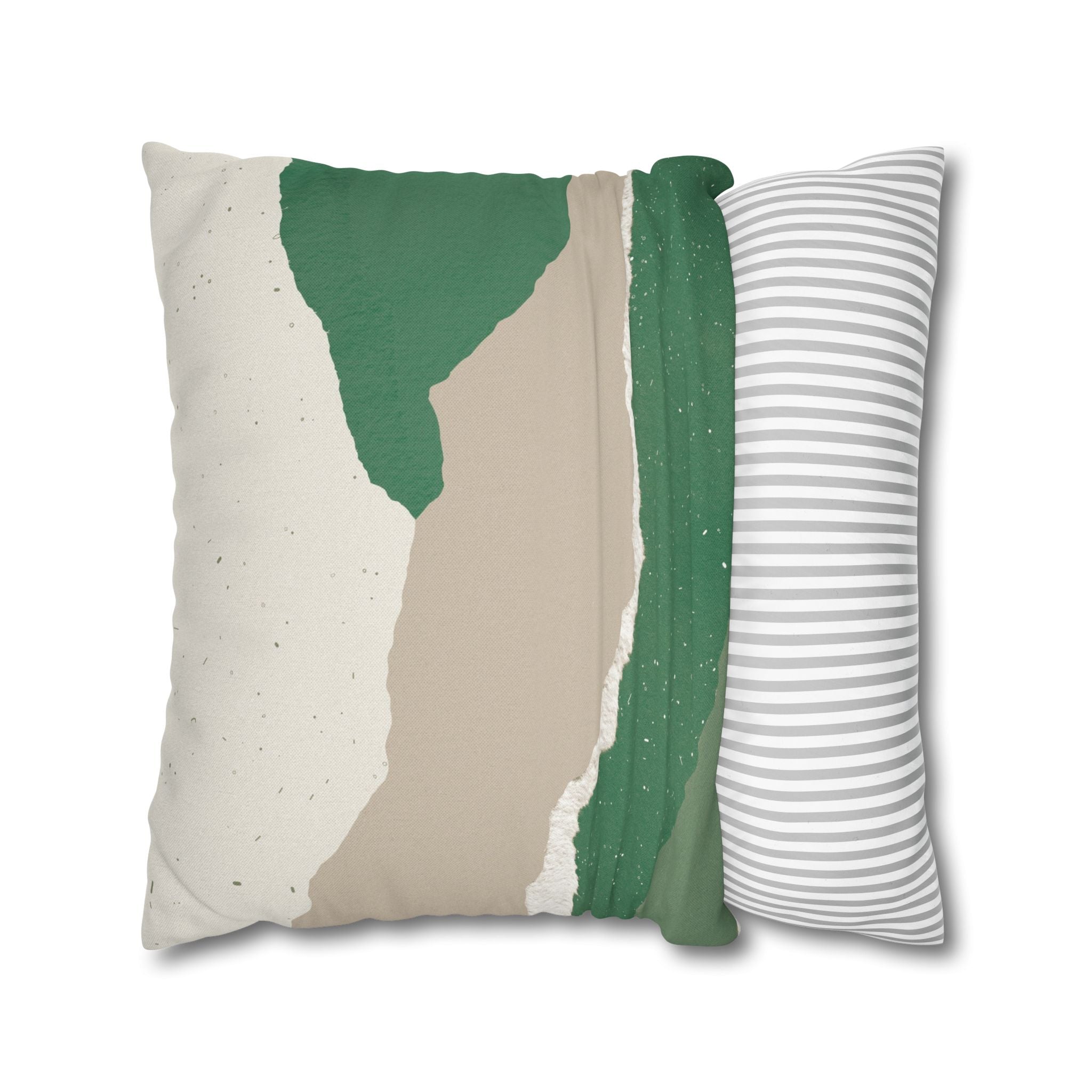 a square pillow with a unique abstract design. The design consists of three distinct colors: green, beige, and gray. The green color is the most prominent, covering a large portion of the pillow. The beige color is present in smaller areas, while the gray color is scattered throughout the design. The pillow appears to be a modern and stylish piece of home decor.