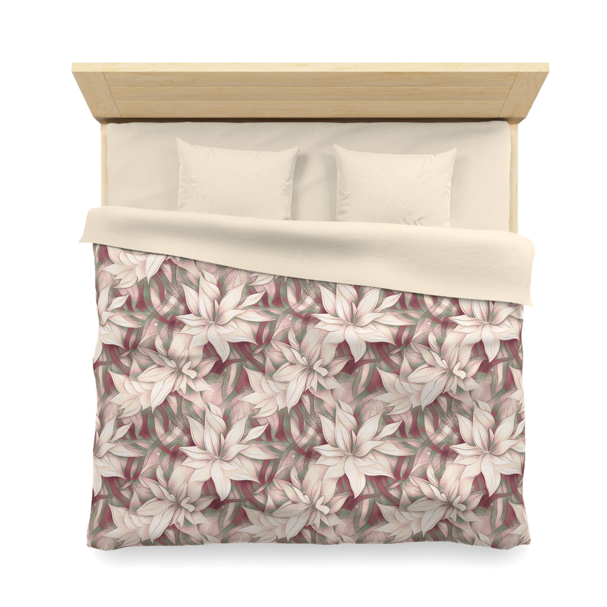a neatly made bed with a floral patterned comforter and pillows.