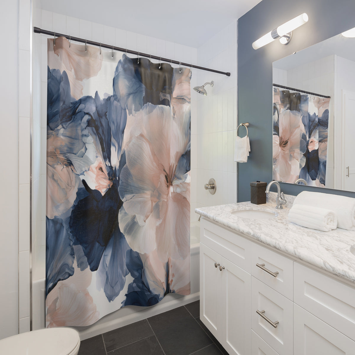 a bathroom with a floral shower curtain in it
