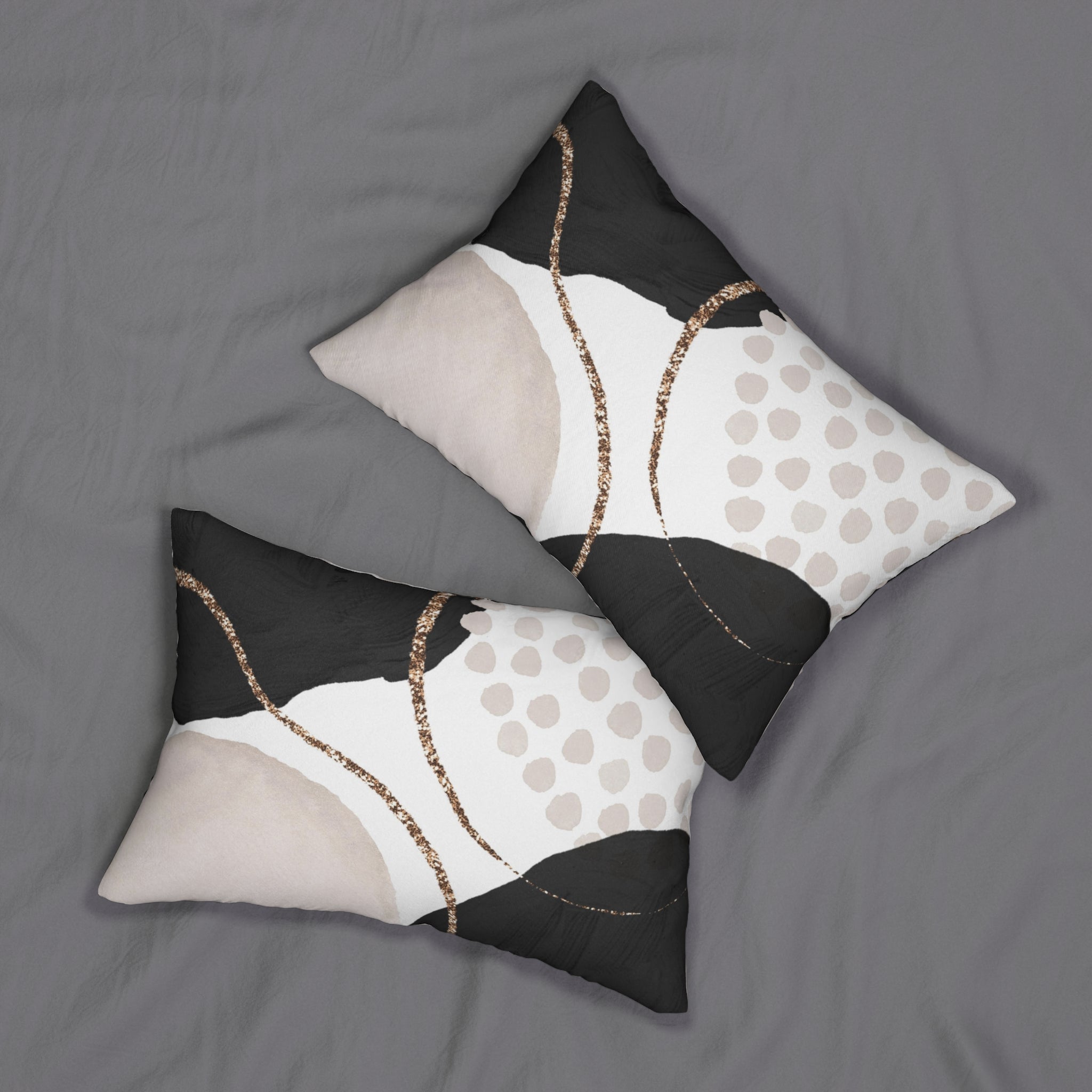 Black, ivory and white abstract lumbar pillow in a modern living room