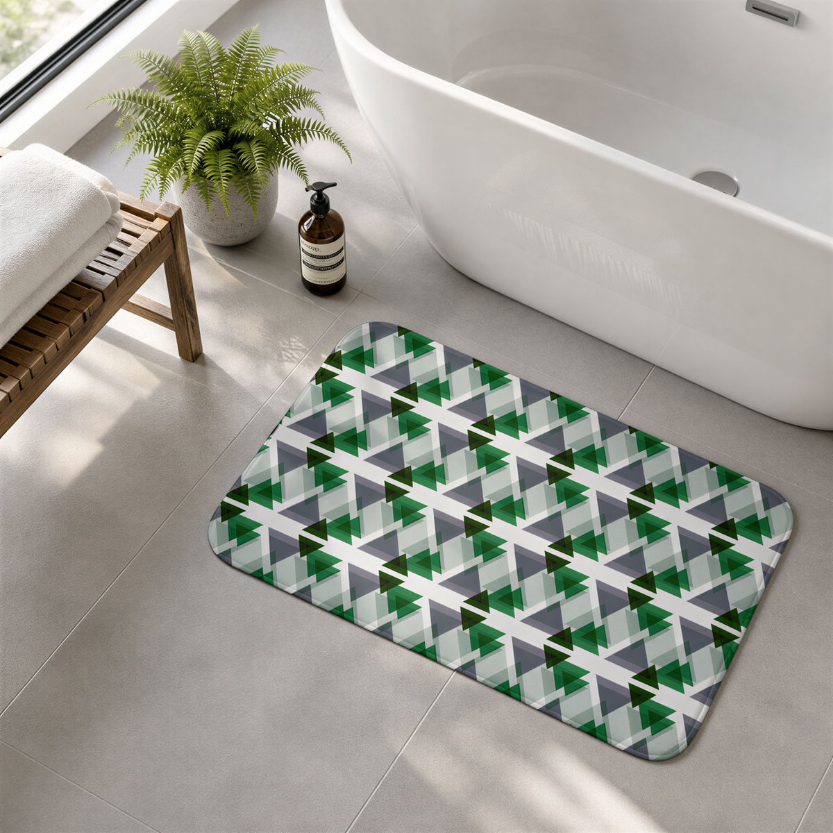 a bathroom with a white bathtub, a green and gray geometric patterned bath mat, a wooden bench, and a potted plant.