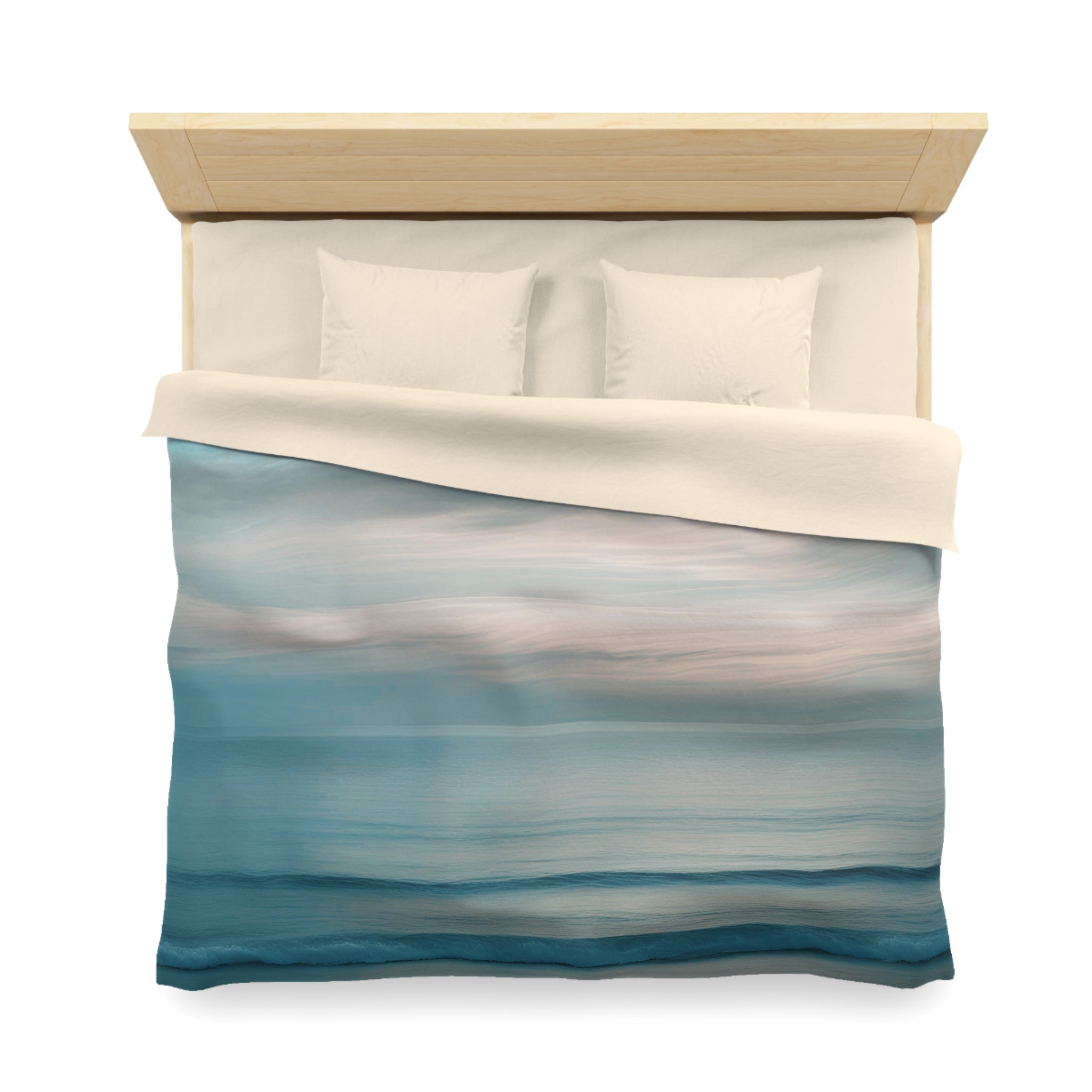 a neatly made bed with a blue and white striped comforter and two white pillows.