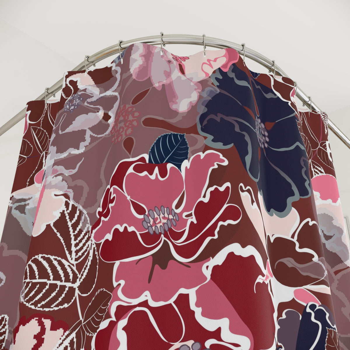a shower curtain with a vibrant floral pattern in shades of red, pink, and blue.