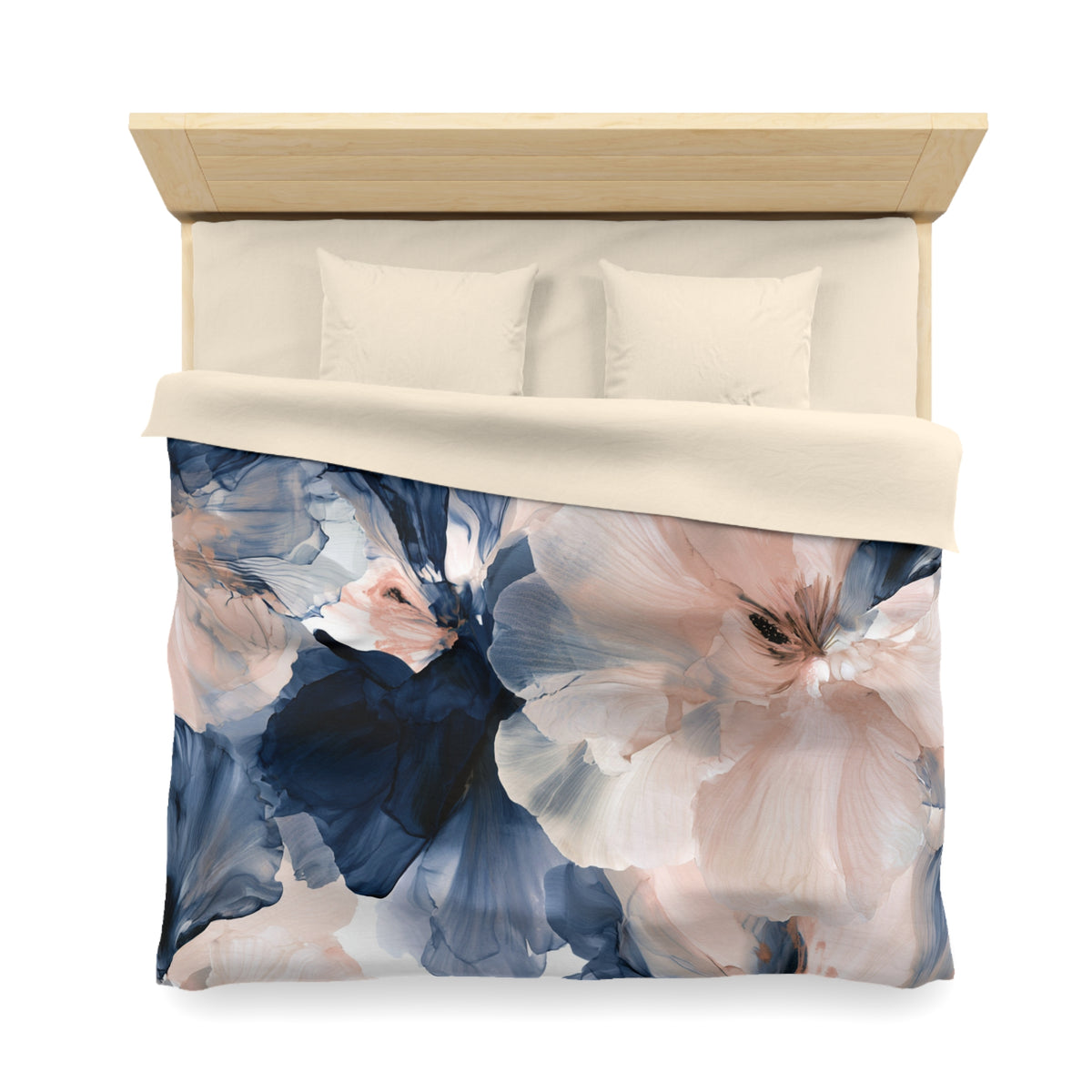 a bed with a blue and pink flower on it