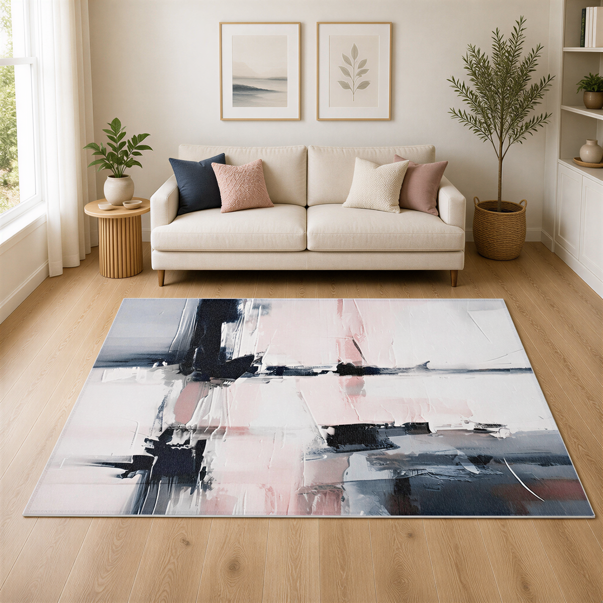 a living room with a large abstract rug on the floor, a white sofa, and two framed pictures on the wall. There is also a potted plant and a vase in the room.