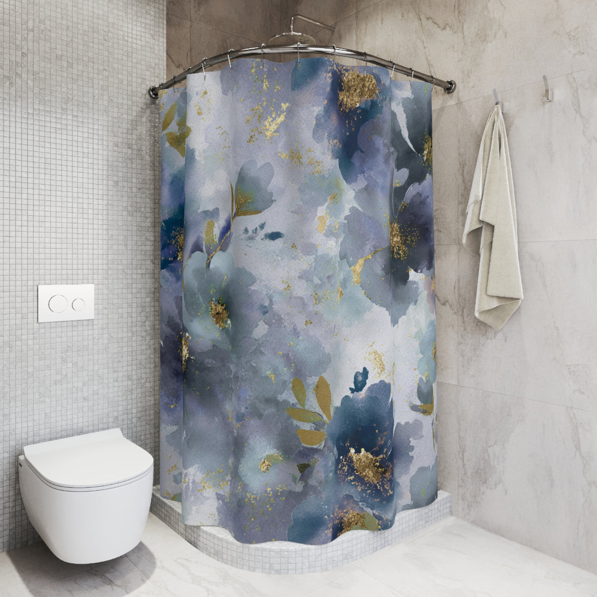 a bathroom with a shower curtain adorned with a floral pattern in shades of blue and gold. The shower curtain is hanging from a rod next to a towel. The bathroom has a white toilet and a white tiled wall.
