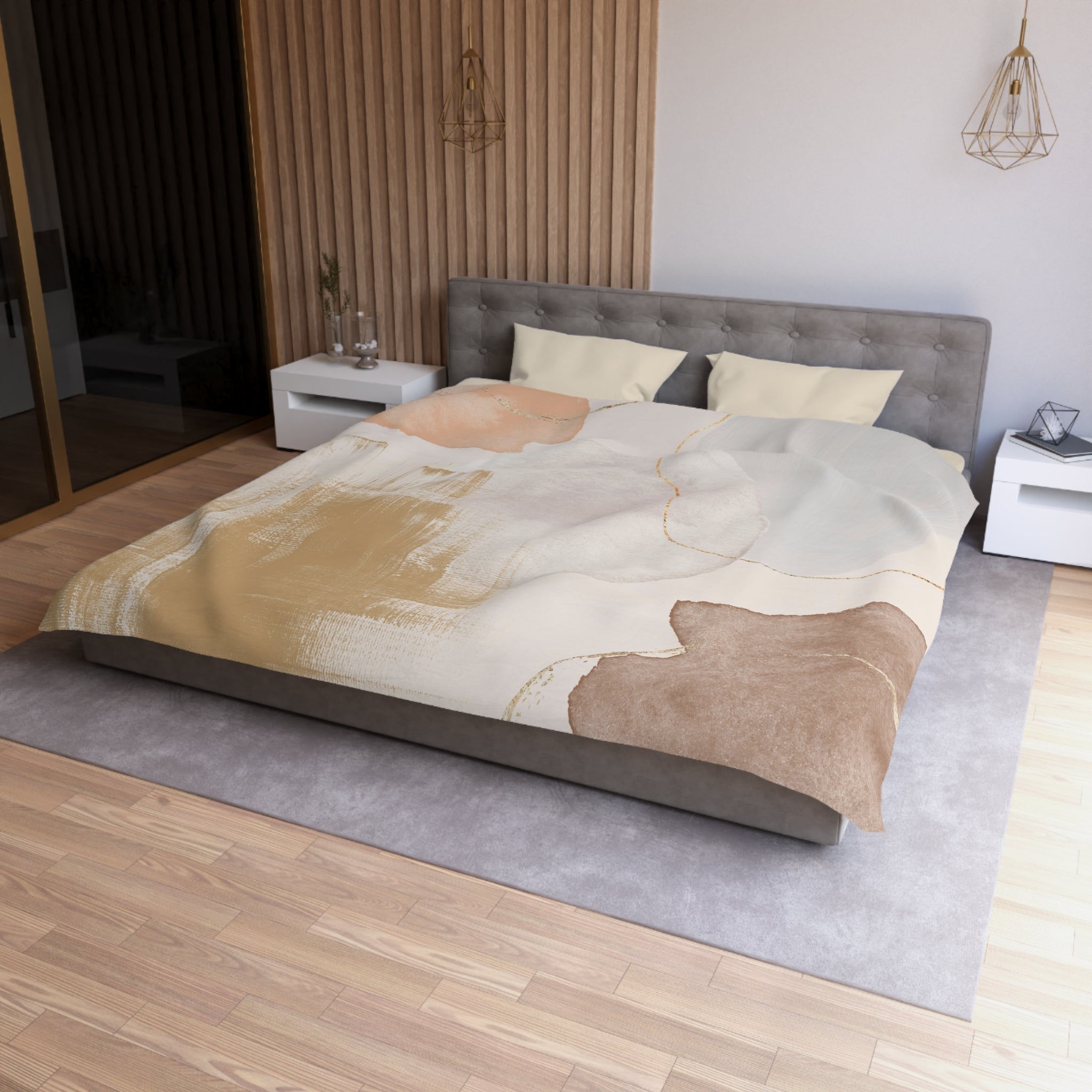 a modern bedroom with a large bed, a gray headboard, and a wooden floor. The bed has a colorful abstract patterned comforter and pillows. There are two nightstands on either side of the bed, and a pendant light hangs above it. The room has a minimalist and clean design, with a focus on the bed and its furnishings.