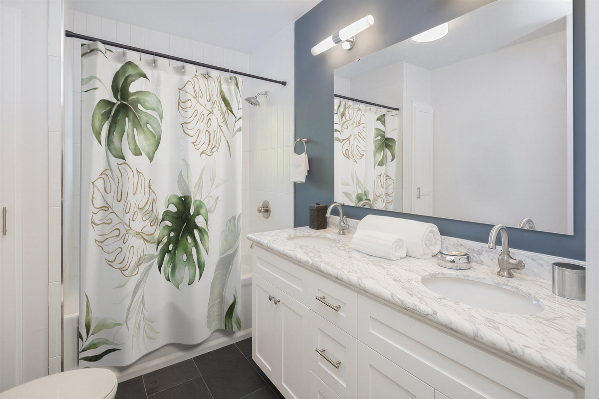 Green White Gold Monstera Leaves Shower Curtain hanging in a modern bathroom