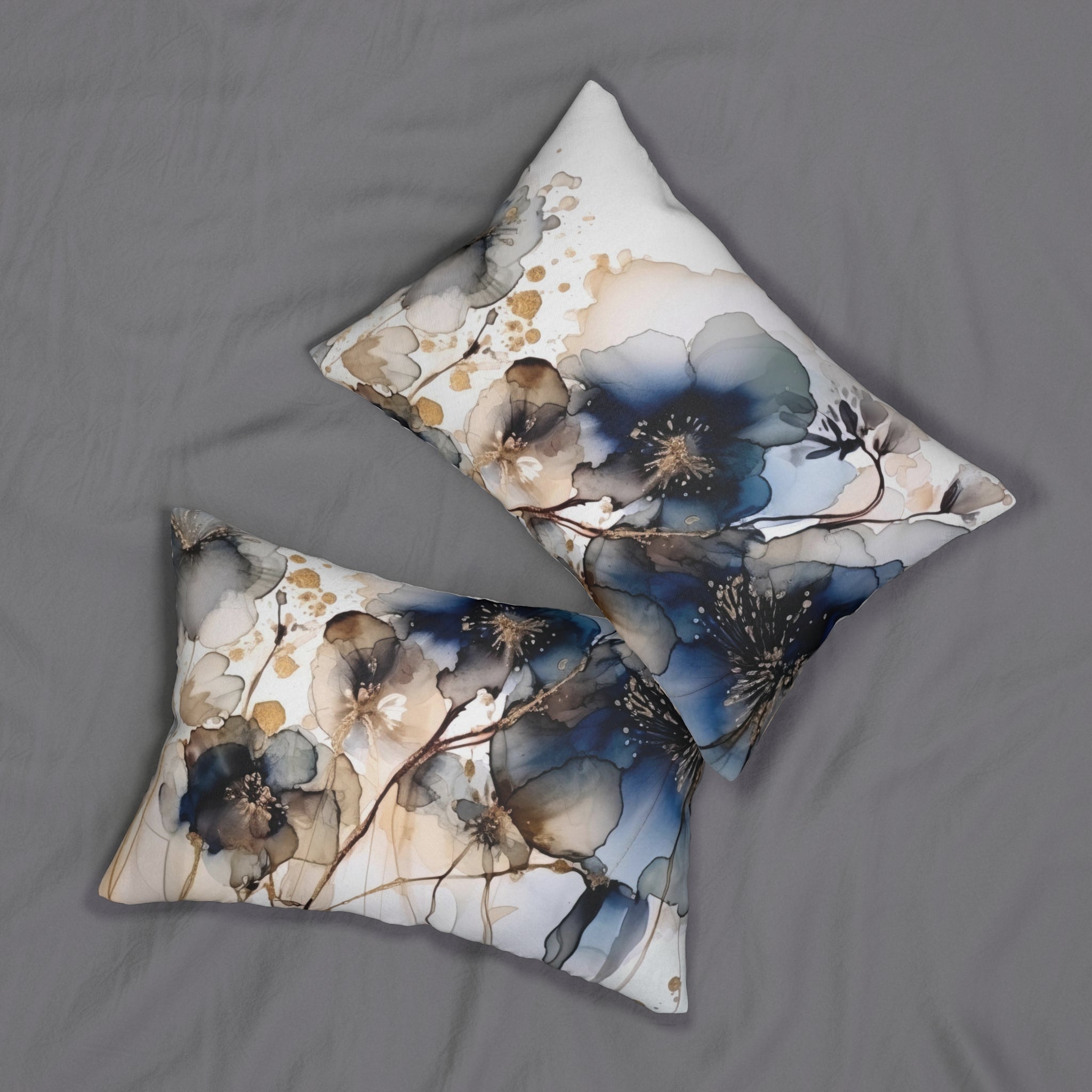 two decorative pillows with a floral pattern on a grey background.