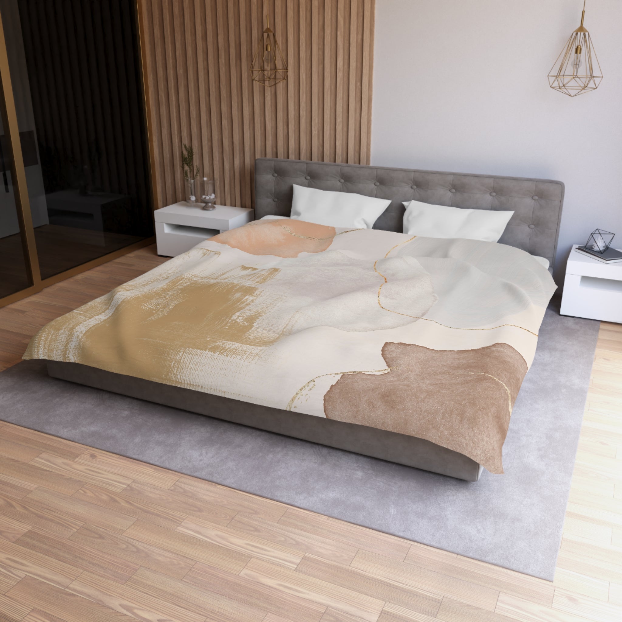 a modern bedroom with a large bed, a gray headboard, and a wooden floor. The bed is covered with a colorful abstract patterned comforter.