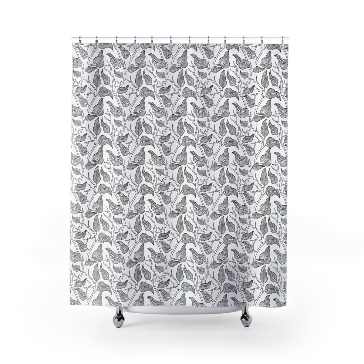 a shower curtain with a repeating pattern of black and white leaves on a white background.