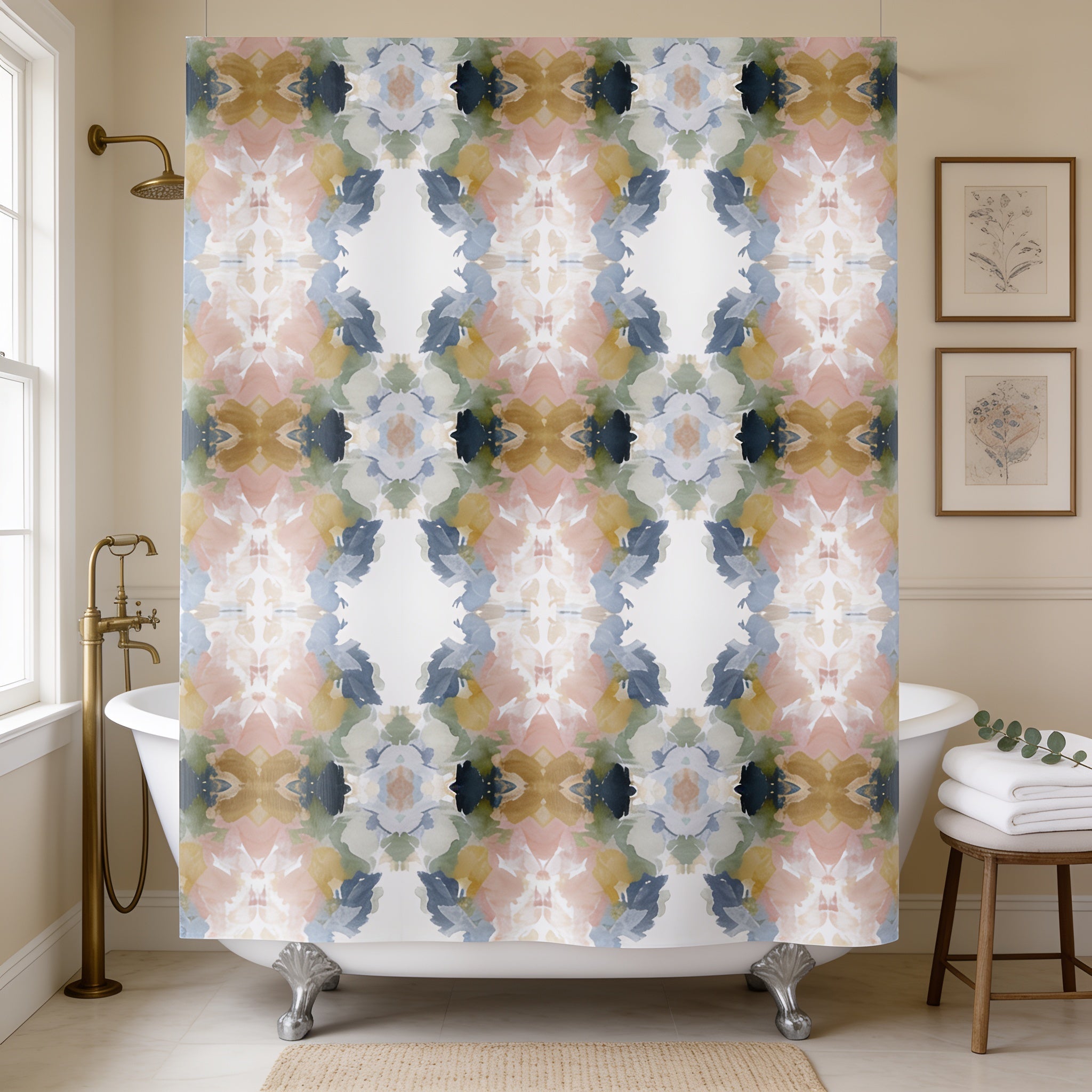 a bathroom with a white bathtub, a shower curtain with a colorful abstract pattern, and framed artwork on the wall.