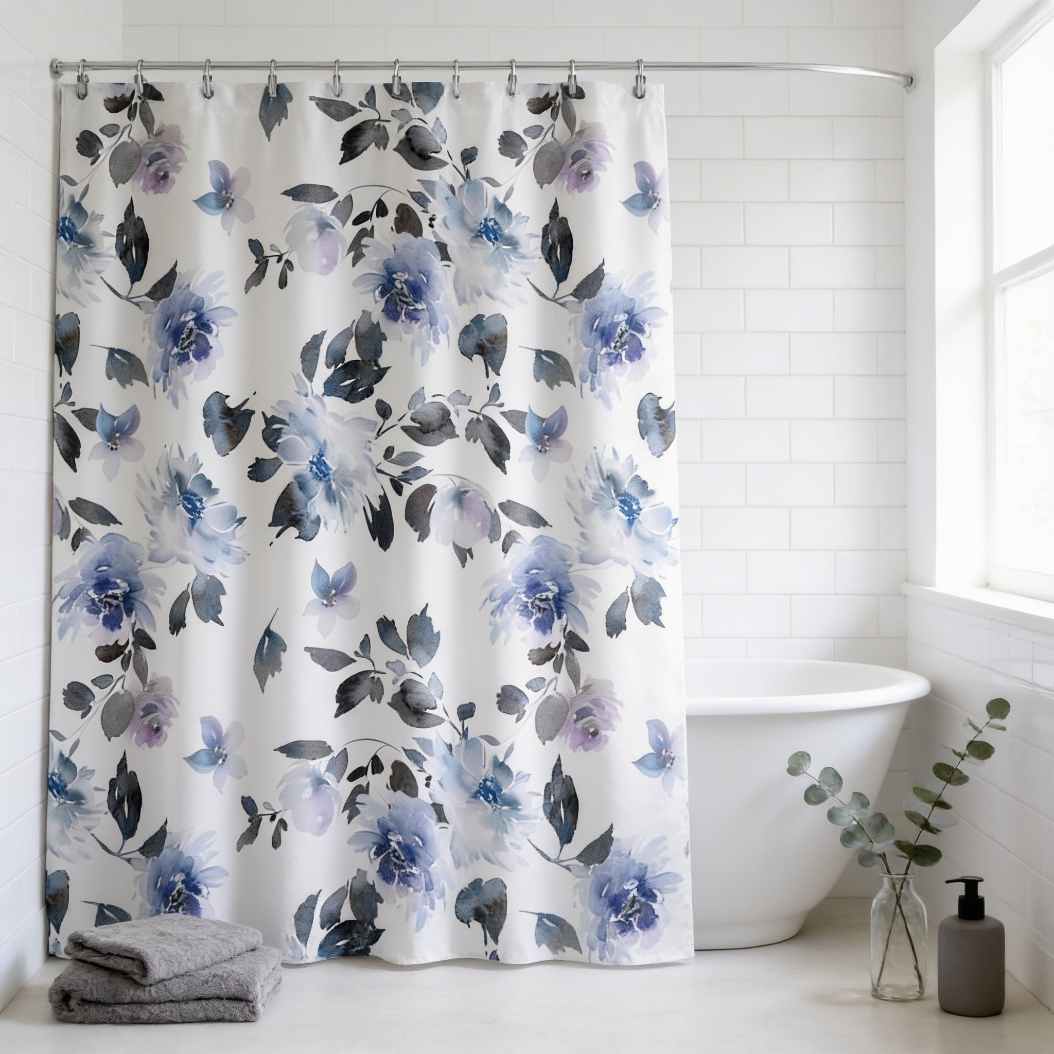 a bathroom with a white bathtub, a shower curtain with a floral print, and a vase of greenery on the floor.