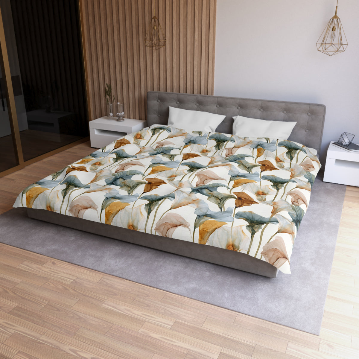 a modern bedroom with a large bed featuring a colorful floral print comforter. The bed is positioned against a wall with a wooden panel, and there are two nightstands on either side of the bed. The room has a wooden floor and a gray area rug, creating a cozy and inviting atmosphere.