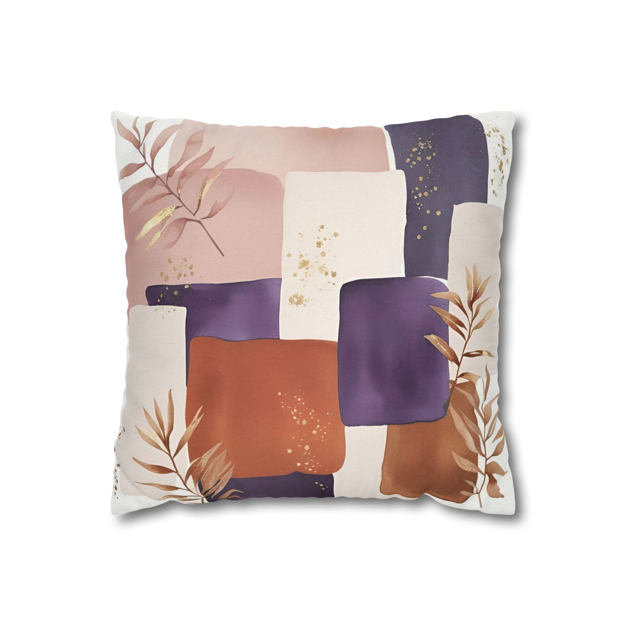 The image is a square pillow with a colorful abstract design featuring various shapes and patterns in shades of pink, purple, and brown.