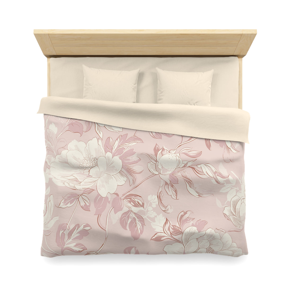a neatly made bed with a floral patterned comforter and pillows.