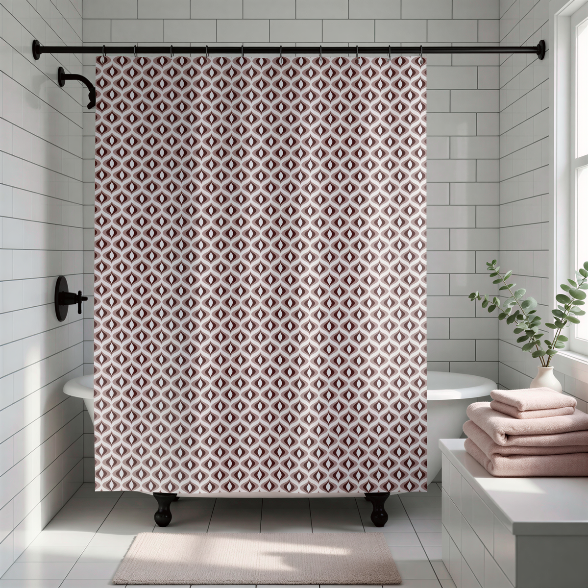 a bathroom with a white bathtub, a shower curtain with a pattern of brown and white diamonds hanging from a rod, and a stack of pink towels on a counter.