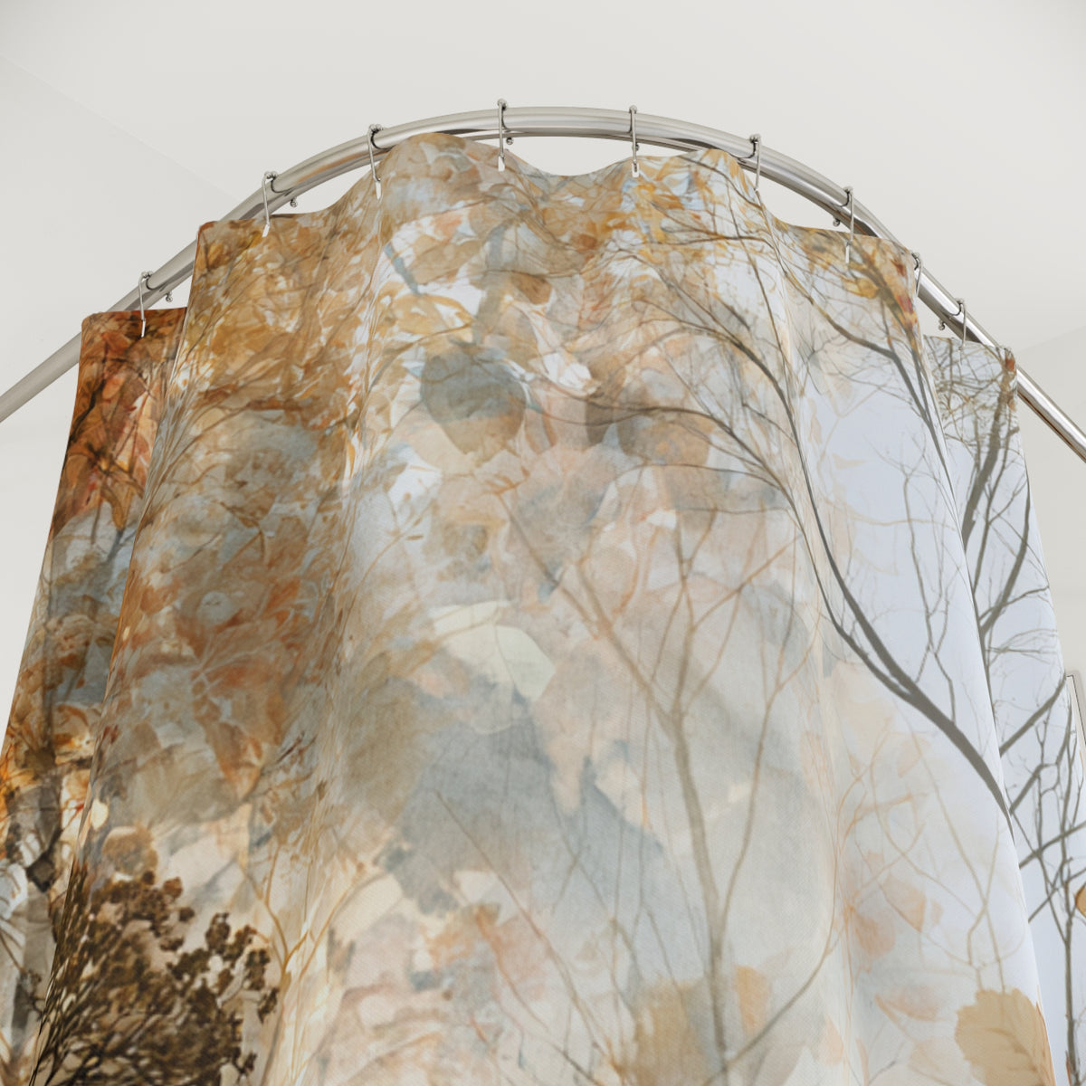 a shower curtain with a nature-inspired design, including trees and foliage.