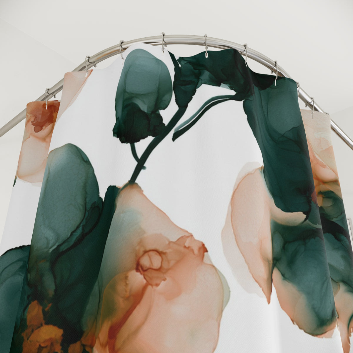 a shower curtain with a floral pattern in shades of green, orange, and pink.