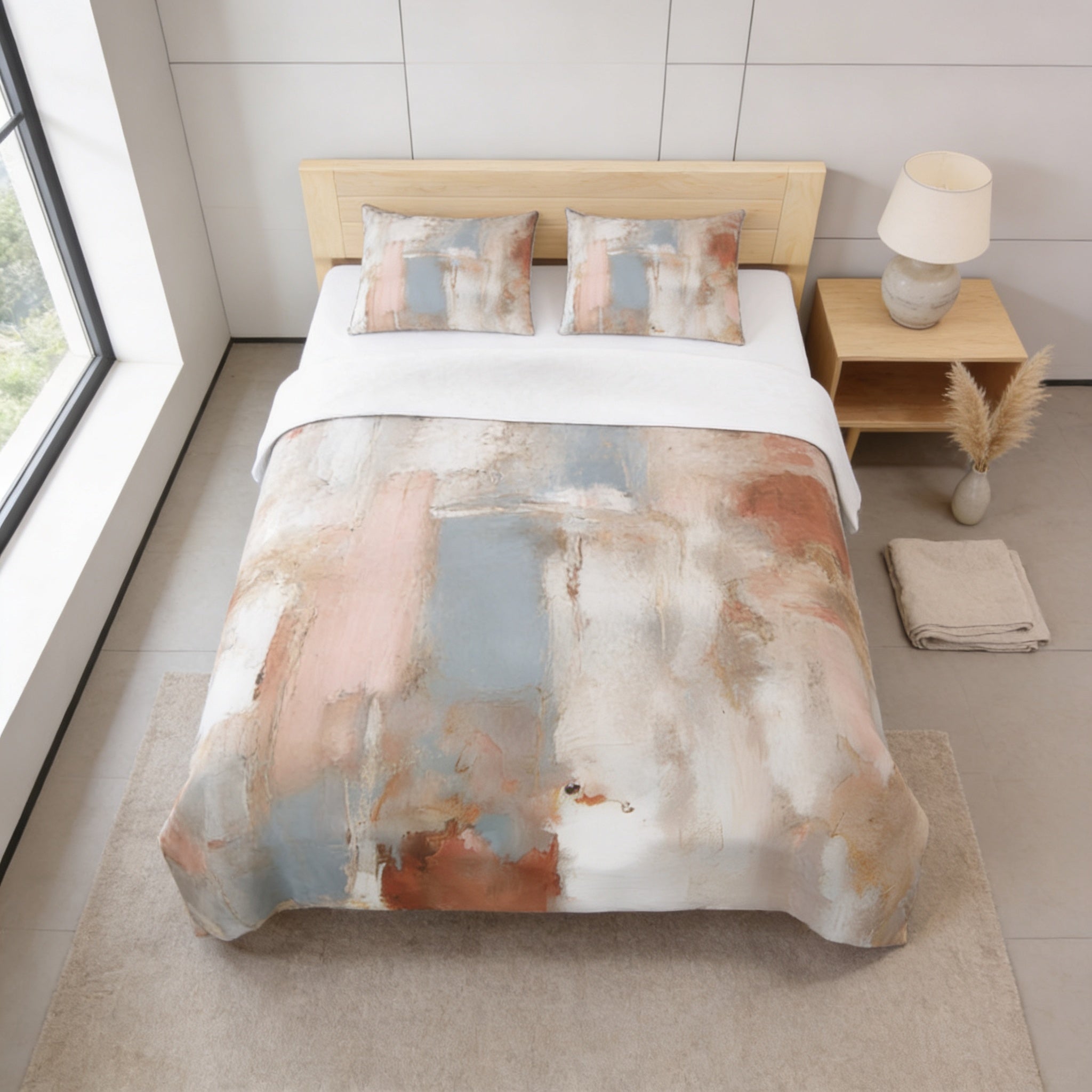 a bedroom with a bed, a nightstand, and a lamp. The bed has a colorful, abstract-patterned comforter and pillows. The nightstand has a lamp on top. The room has a window and a rug on the floor.