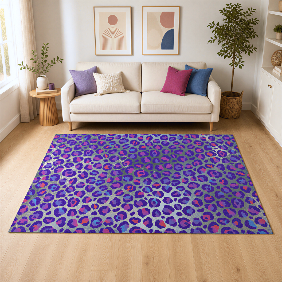 a living room with a white sofa, a leopard print rug, and two framed abstract artworks on the wall.