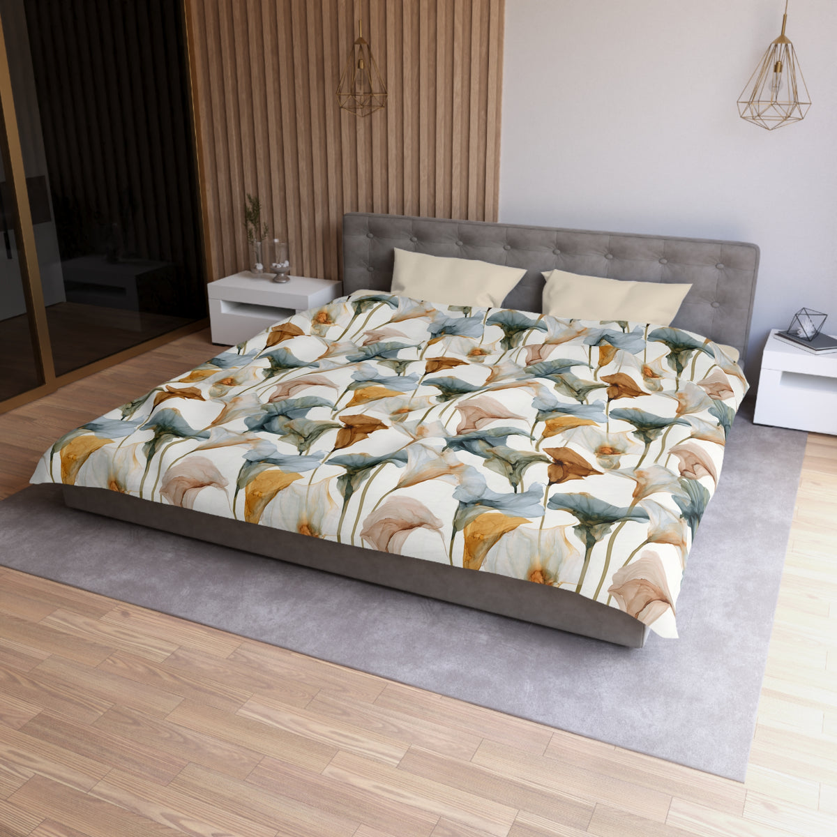 a modern bedroom with a large bed featuring a colorful floral print comforter. The bed is positioned against a wall with a wooden panel, and there are two nightstands on either side of the bed. The room has a wooden floor and a gray area rug, creating a cozy and inviting atmosphere.