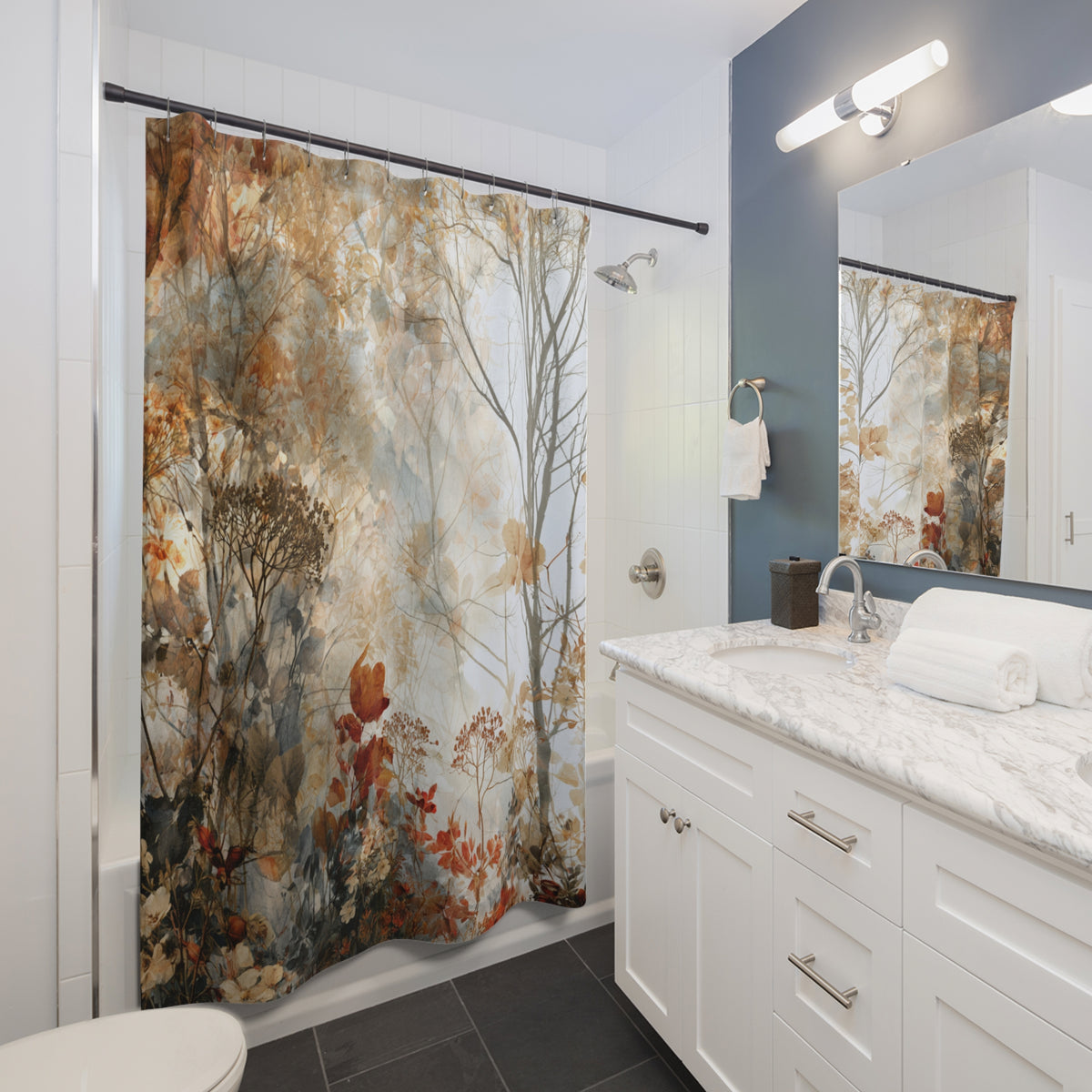 a modern bathroom with a white vanity, a shower curtain featuring a forest scene, and a mirror above the vanity.