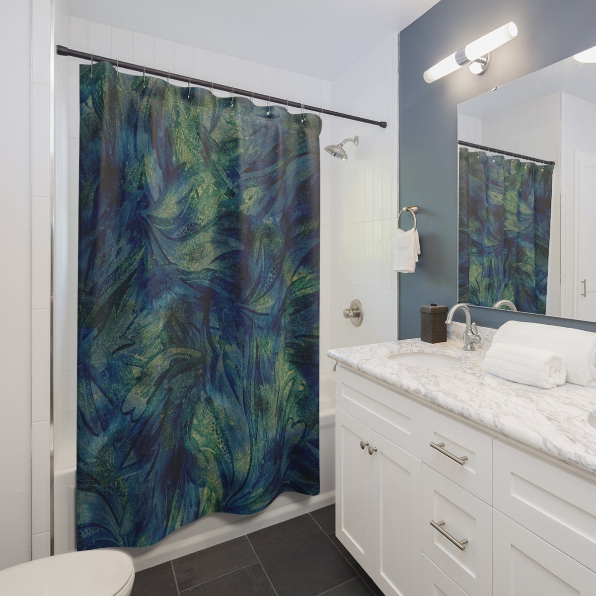 a modern bathroom with a white vanity, a shower curtain with a colorful abstract design, and a mirror above the vanity.