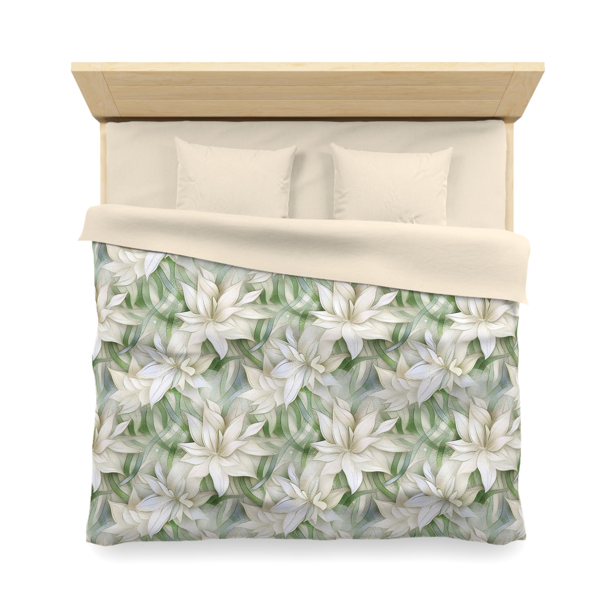 a neatly made bed with a floral patterned comforter and pillows.