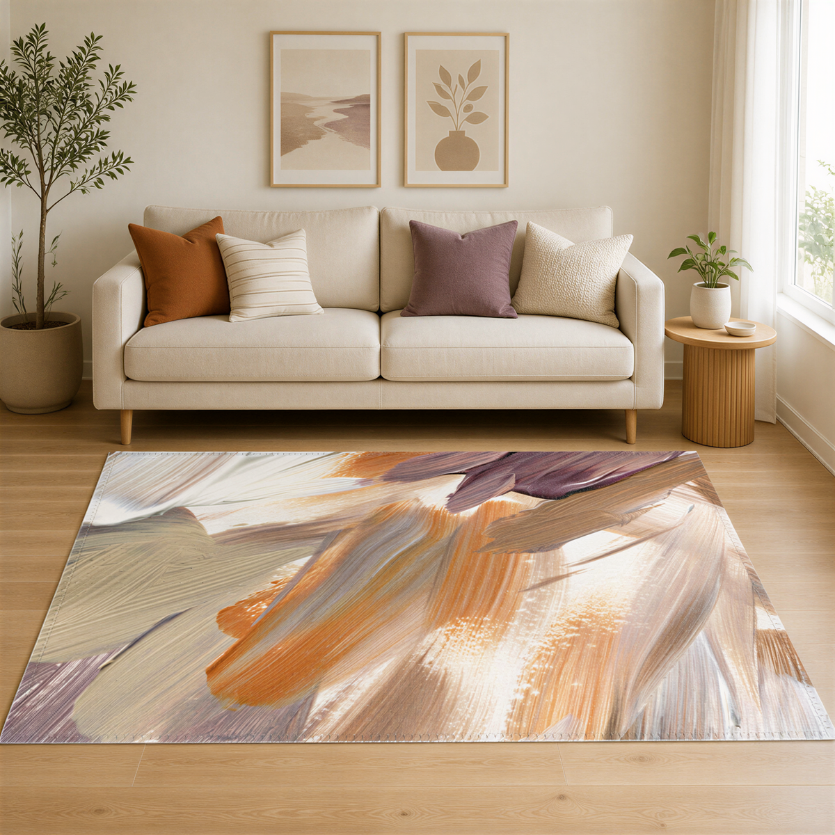 a living room with a white sofa, a large abstract rug, and two framed paintings on the wall.