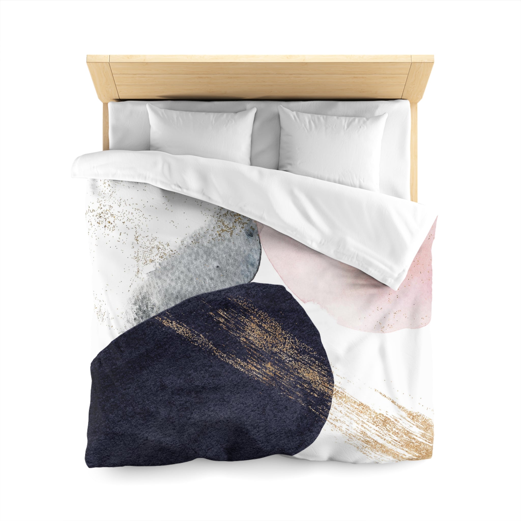 a bed with a white comforter and a colorful abstract pattern on the bedspread.