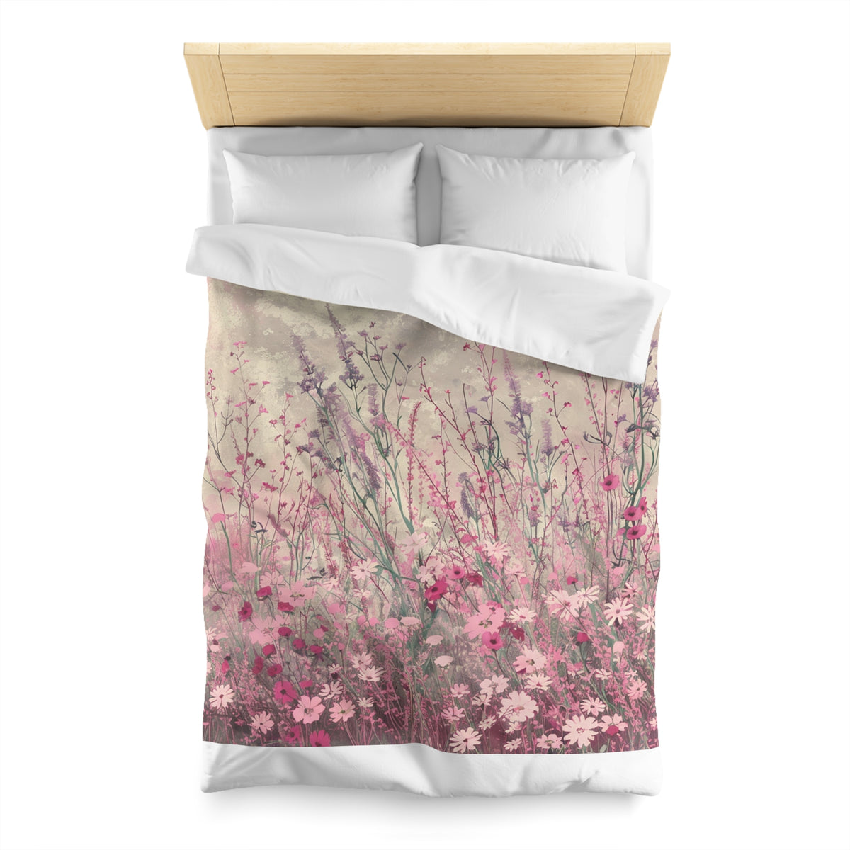 a bed with a floral print on the comforter and pillows.