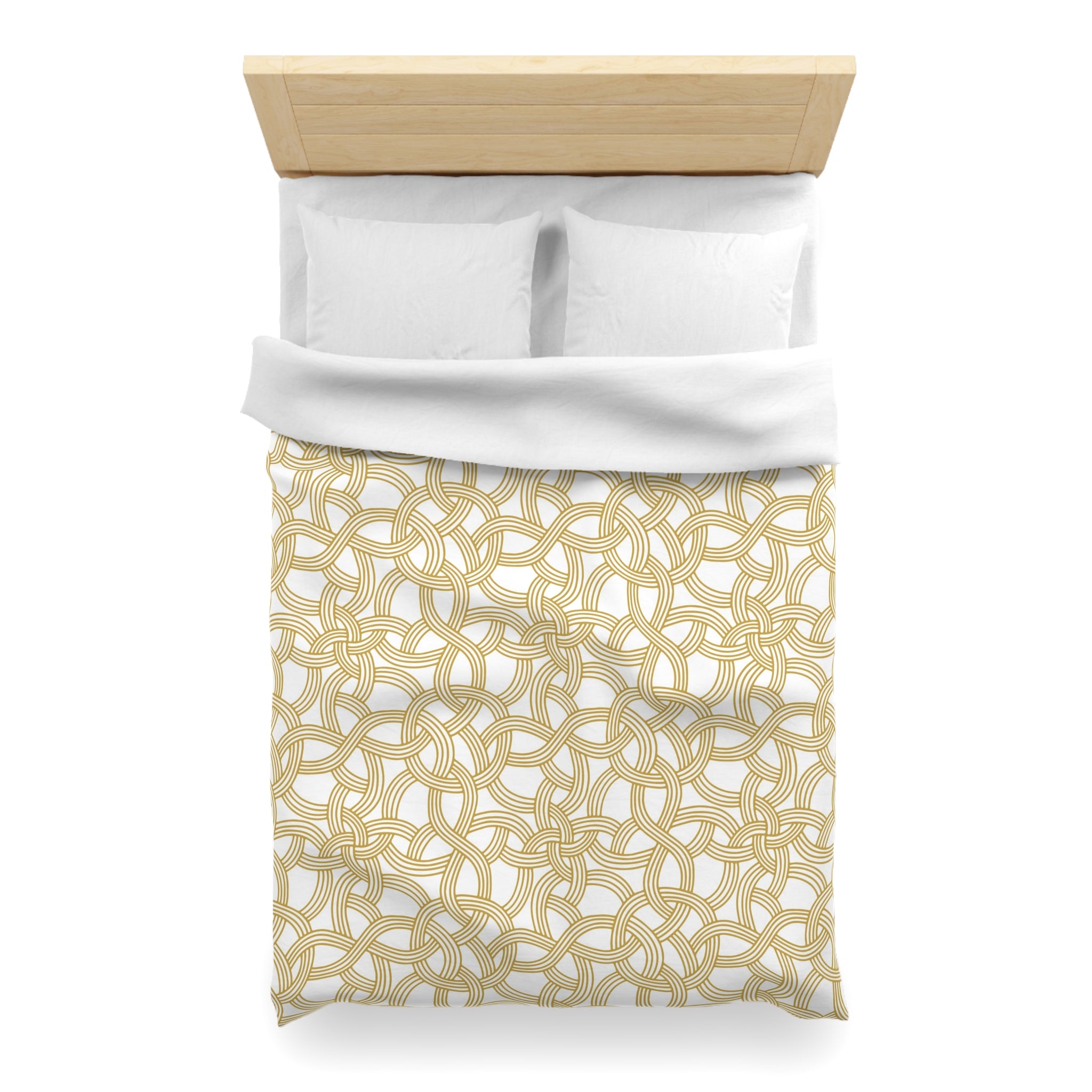 a neatly made bed with a white comforter and a gold patterned bedspread.