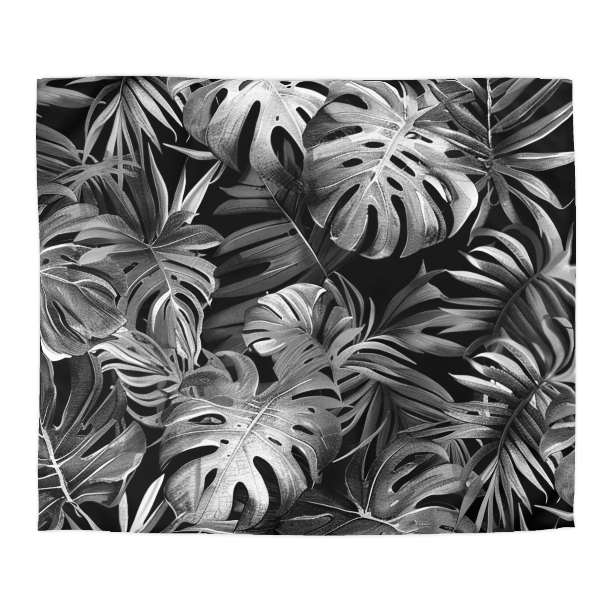 A black and white image featuring a dense arrangement of large, intricate leaves with a textured appearance.