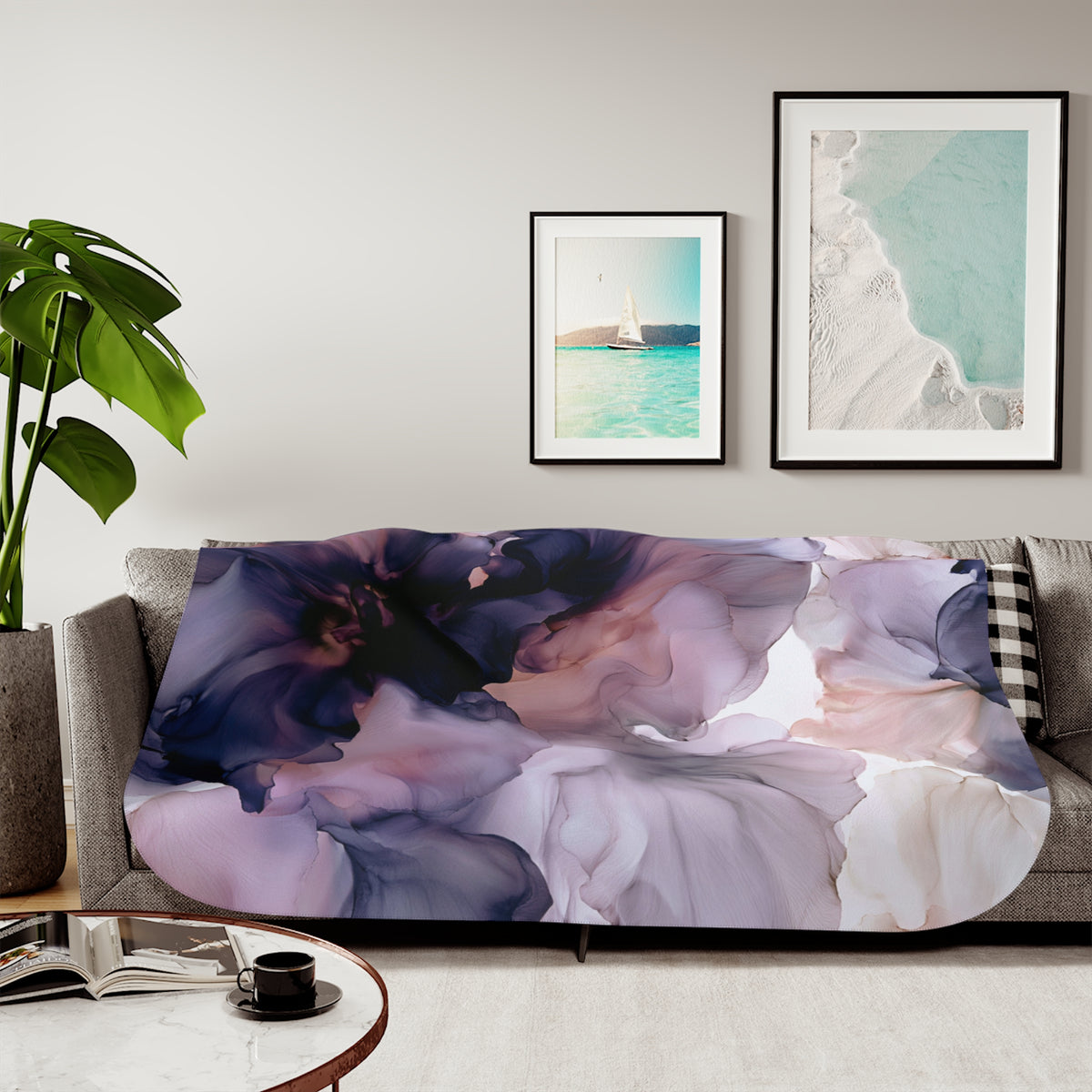 a living room with a couch covered in a blanket