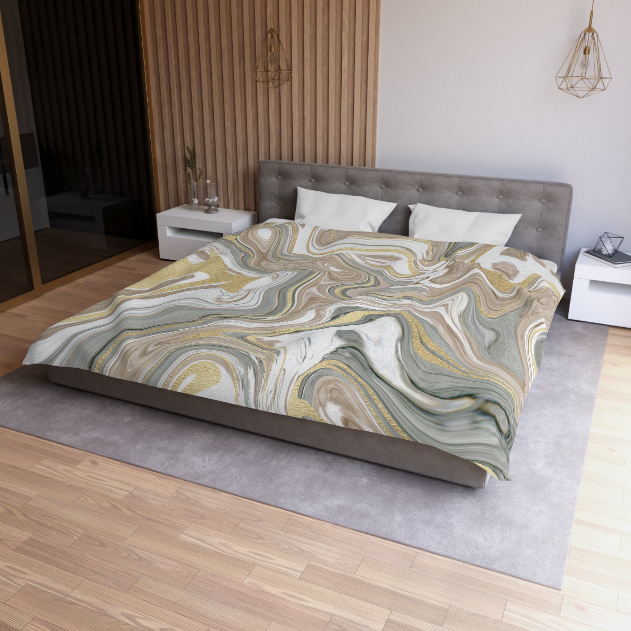 a modern bedroom with a large bed covered in a colorful, abstract patterned comforter. The bed is positioned against a wall with a wooden panel, and there are two nightstands on either side of the bed. The room has a minimalist and contemporary design, with a gray headboard and a wooden floor.
