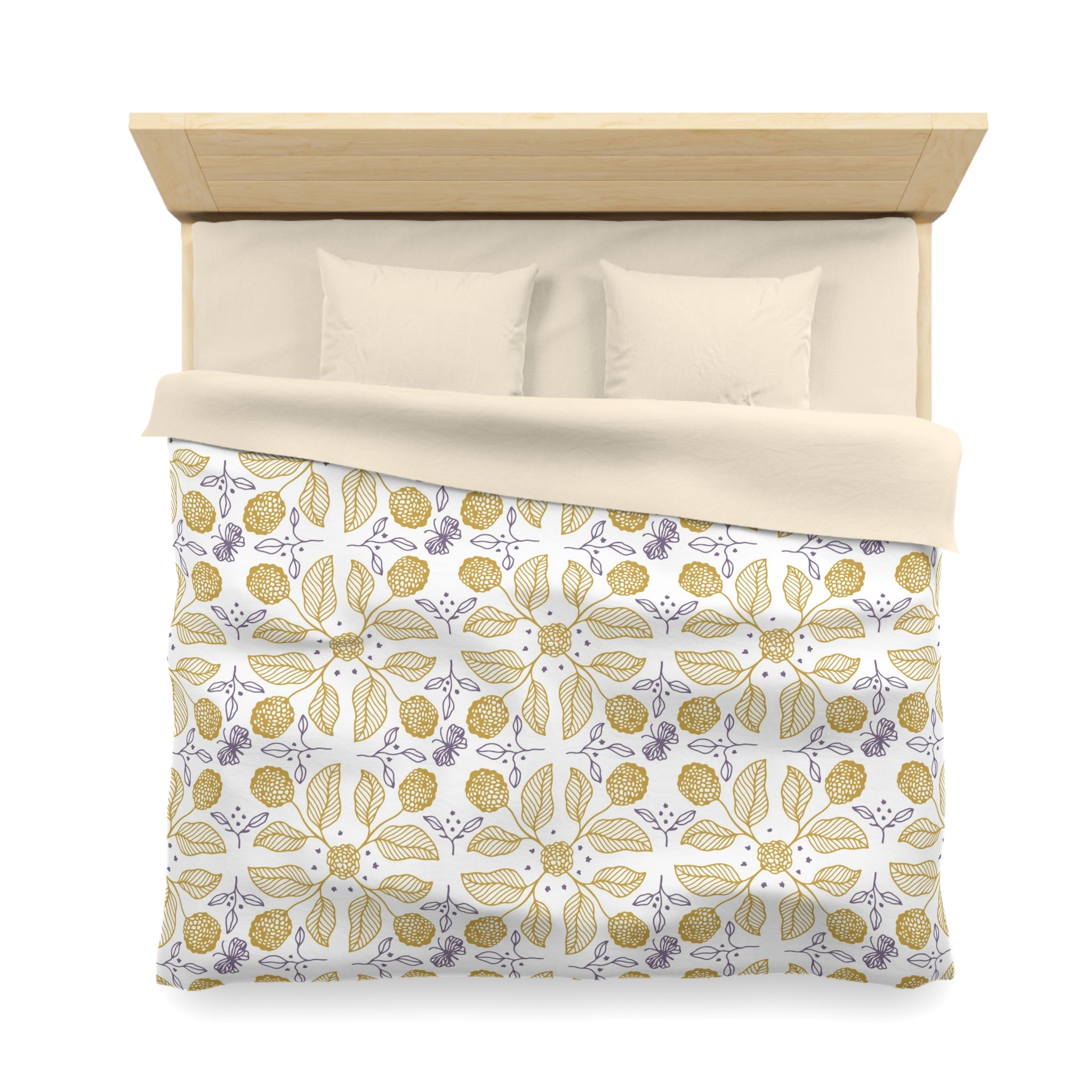 a neatly made bed with a white comforter and a patterned duvet cover featuring a floral design in shades of yellow and purple.