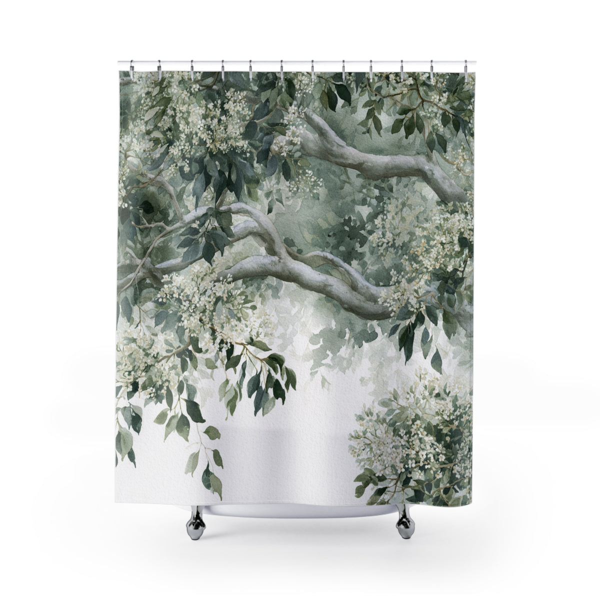 A shower curtain with a lush, green tree branch design, featuring delicate white flowers and leaves.