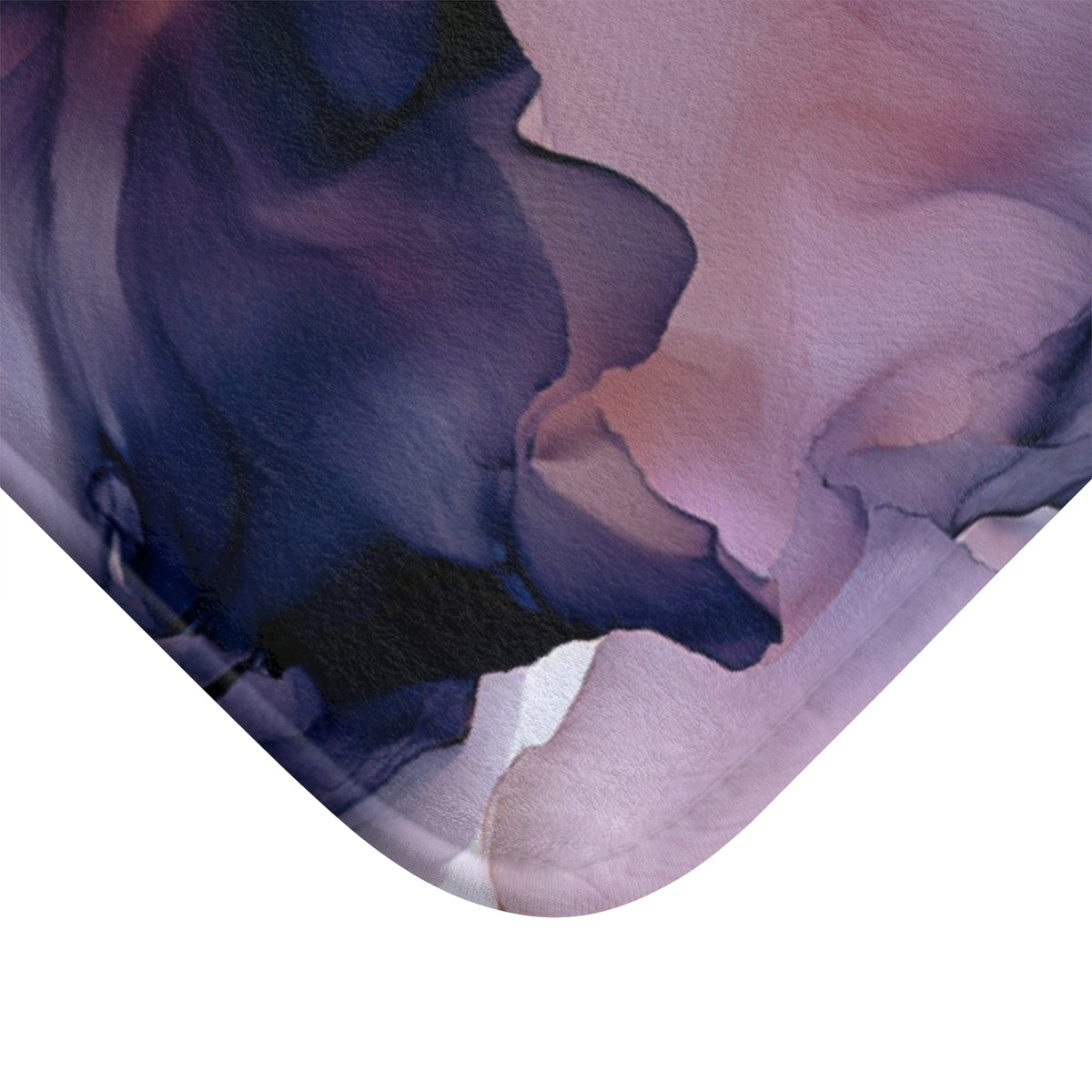 a close up of a tie with a flower on it