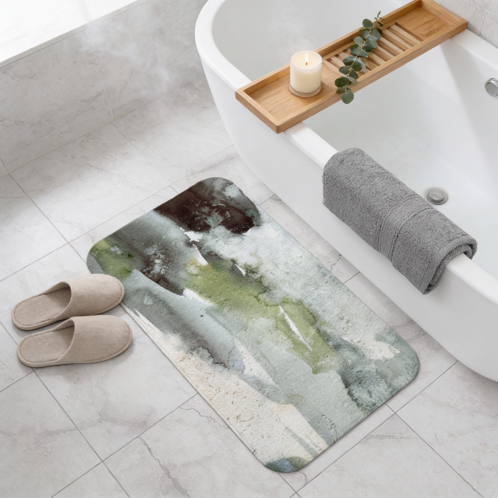 a bathroom with a white bathtub, a wooden tray with a candle and greenery, and a green and white bath mat on the floor.