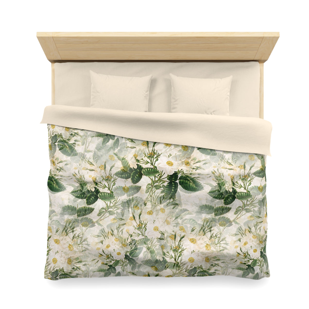 a neatly made bed with a floral print comforter and pillows.